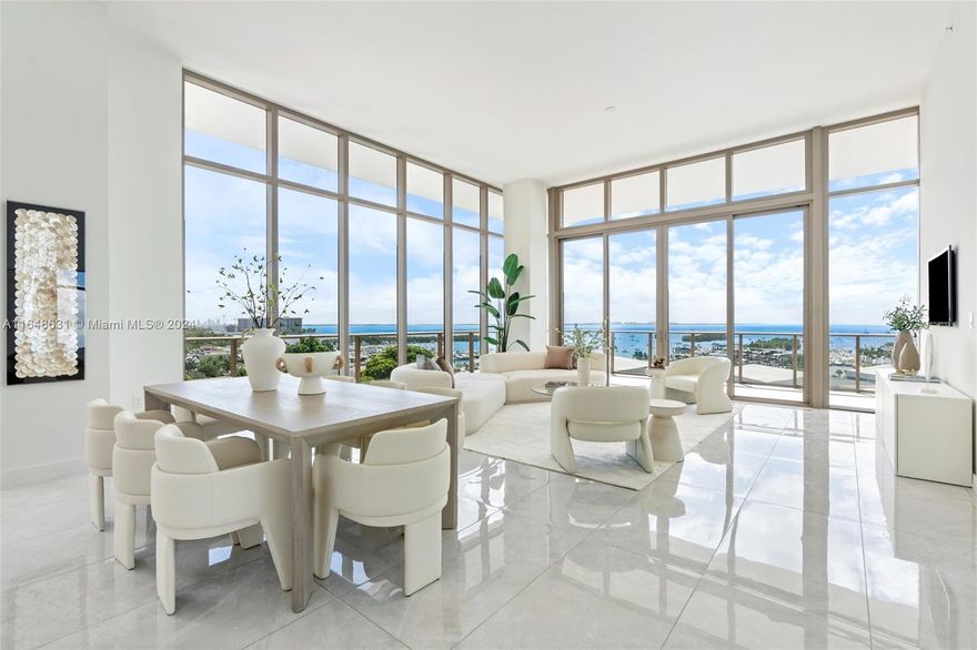 World-class architecture and interiors define Mr.C Residences (Bayshore Tower),the quintessential new development set in the heart of Coconut Grove. This stunning ,spacious light-filled 2623 SF interios of the most sought after 02 line features the Very best panoramic view of the wide Biscayne bay & endless waterview in all corners! Hi 12' floor to ceilings. Refined finishes include custom crafted Italian quartz island kitchen, import porcelain floor and luxurious appointments throughout. 815 SF wrapped around terraces,floor to ceiling walls of glass. Additional wet-bar. 24 hour concierge, the ultimate upscale amenities to ensure the sophisticated lifestyle of unparalled comfort & luxury! Much more! 
2 car private car parking spaces & valet! The ultimate Grove living & conveniences!