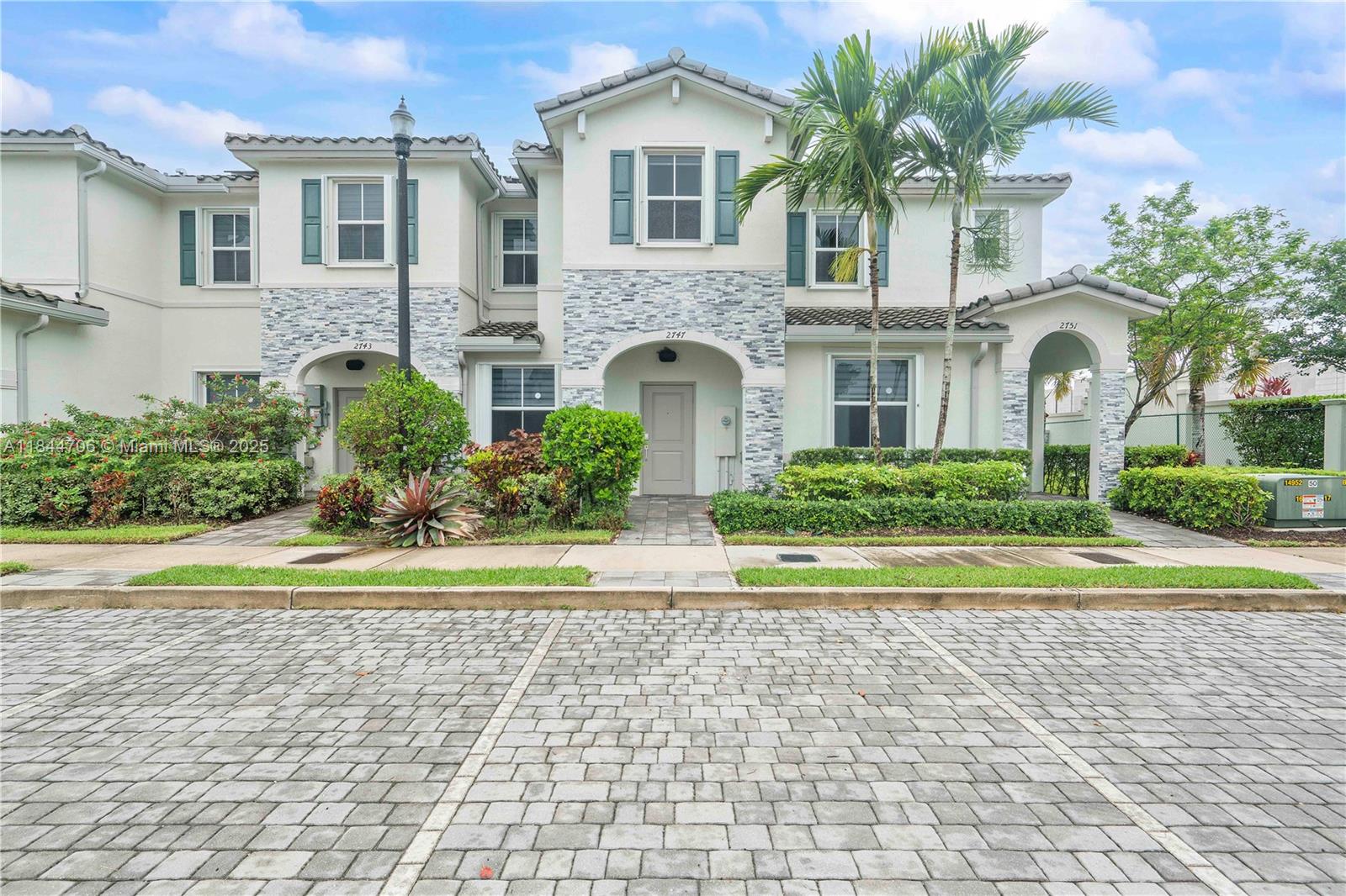Seize this exceptional chance to own a never-occupied former model home situated in the desirable Riviera at Keys Gate! This beautifully appointed 3-bedroom, 2.5-bath townhome boasts a bright, airy layout designed for today's lifestyle. The kitchen features sleek white cabinetry, quartz countertops, stainless steel appliances, and a casual breakfast bar ideal for both entertaining and everyday use. Enjoy the private, fully fenced backyard with low-maintenance landscaping, perfect for outdoor enjoyment. Residents also enjoy access to a resort-style clubhouse, sparkling pool, and fitness center. Conveniently located near restaurants, shopping, and just a short drive to the Florida Keys. Square footage is approximate.