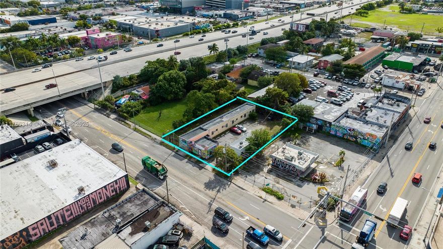 Prime Development Opportunity in Allapattah/Wynwood Junction. 14,000 SF three-parcel assemblage features mixed-use leasable space, including a 7-unit duplex and an office building  located in Allapattah, just one block from Wynwood’s Art & Entertainment District. Currently generating cash flow from below-market leases, this property offers significant upside potential. Zoned D2, it allows for up to 8 floors of new construction and various uses, including retail, hotel/inn, bed & breakfast, and, show room/and  offices. Nearby, Amazon has leased office space, and developments like Dorsey are within walking distance. With a short drive to Miami Beach, Downtown, and Brickell, this is an exceptional opportunity for developers or investors looking to capitalize on a rapidly growing area.