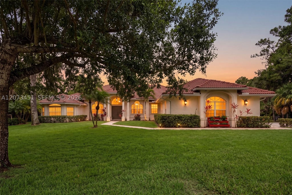 Photo of 1215 Stallion Dr, Loxahatchee, FL 33470 (MLS # A12073451)