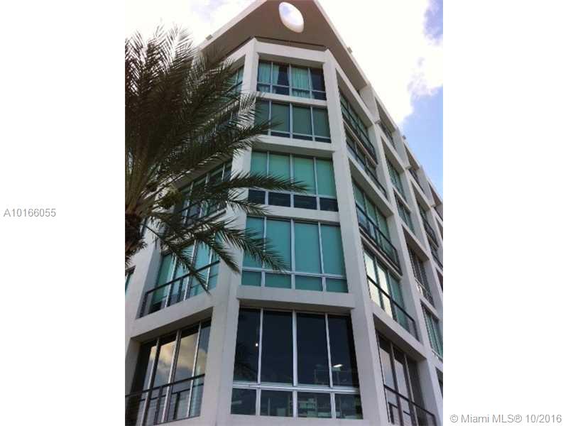 SPACIOUS LOFT LOCATED AT 79TH AND BISCAYNE, JUST MINUTES TO THE DESIGN DISTRICT, MIDTOWN AND DOWNTOWN, MIAMI BEACH AND MORE. BUILDING ALLOWS USE AS HOME AND/OR OFFICE. BRIGHT WITH GREAT VIEWS. WASHER AND DRYER INSIDE THE UNIT. TWO ASSIGNED PARKING SPACES. BUILDING HAS ROOFTOP JACUZZI, GYM, SECURITY, LOBBY WITH RECEPTIONIST. SEE BROKER REMARKS FOR SHOWING INSTRUCTIONS.