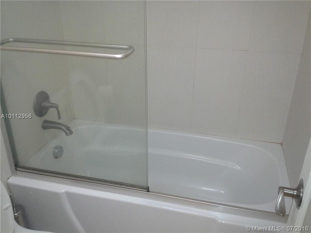 COMPLETELY RENOVATED STUDIO WITH TASTEFUL FINISHING. BUILT IN CUSTOM MADE MURPHY BED AND STAINLESS STEEL APPLIANCES. READY FOR MOVE IN, JUST BRING YOUR TOOTHBRUSH.... BUILDING IS OCEANFRONT, WITH LARGE POOL AND LOCATED CLOSE TO SHOPPING PLAZAS. ELECTRICITY IS INCLUDED!!!!