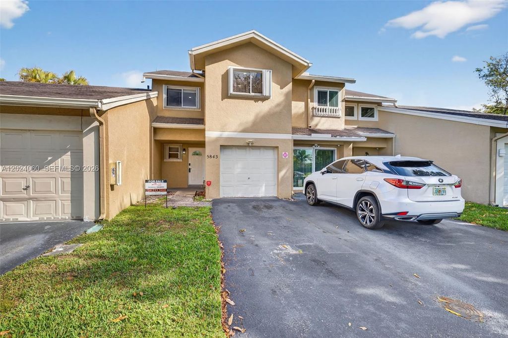 Photo of 5843 Woodlands Blvd #5843, Tamarac, FL 33319 (MLS # A12024060)