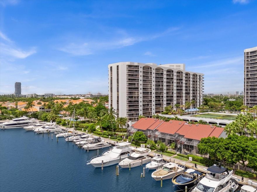 This beautiful 1,187 sq. ft. condo with two bedrooms and two baths offers unobstructed views from every room, overlooking the waterways marina and Gulfstream. Featuring hardwood floors in the living areas, carpeted bedrooms, and a spacious main suite with double vanities and a large walk-in closet. The kitchen includes stainless steel appliances, in-unit laundry, and extra storage. Highlights include three deeded parking spaces and resort-style amenities, including heated swimming pools on the marina, spa, sauna, tennis courts, a gym and it is a pet-friendly community. Conveniently located near restaurants and just minutes from the mall and beaches.