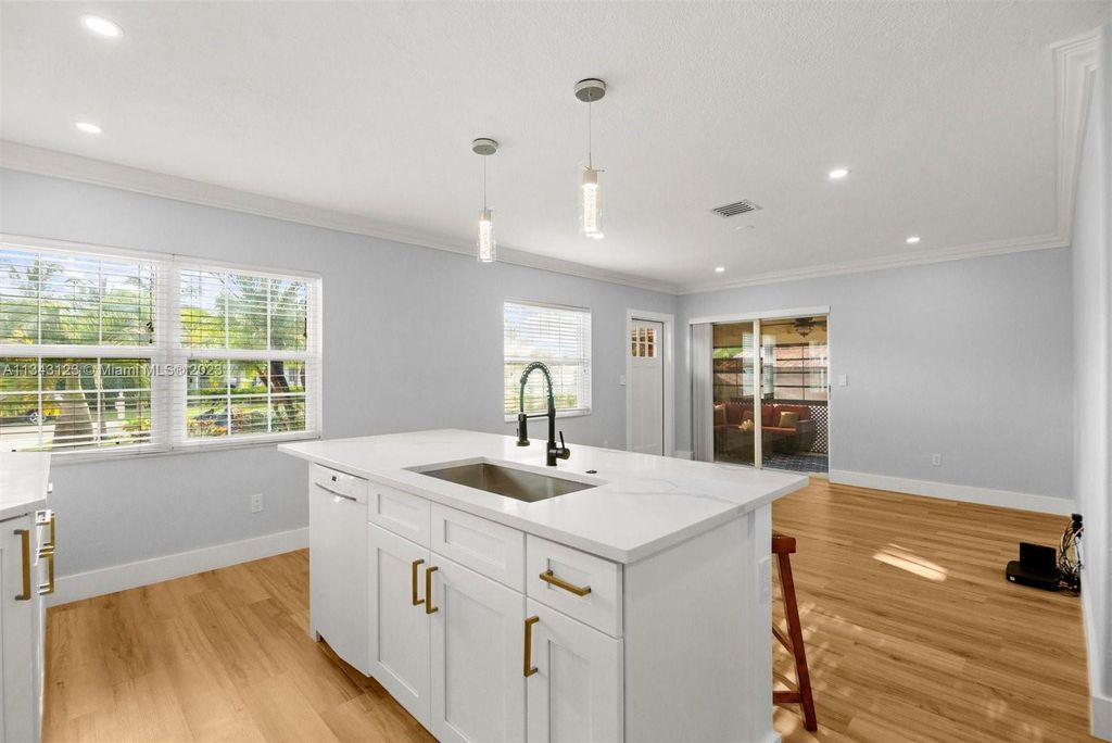 Photo of 404 S Caloosahatchee Ave, Jupiter, FL 33458 (MLS # A11343123)