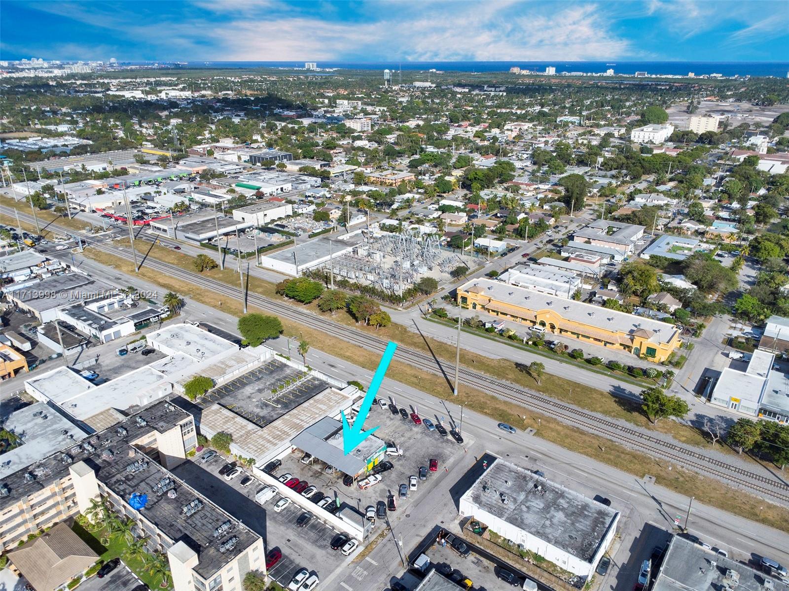 This highly visible corner lot at N. Dixie Hwy and Pierce St. offers exceptional frontage, with approx. 115’ on N. Dixie Hwy and 150’ on Pierce St. Currently operating as a automotive dealership and repair shop. The freestanding building totaling approx. 1,282 SF, featuring: 3 roll-up door bays; 5 car lifts under a covered overhang; and a brand-new paint booth equipped with fire suppression and exhaust fans. The expansive lot offers ample parking to accommodate a large vehicle inventory. DH-3 zoning supporting a wide range of uses. Plus, its located within the Downtown CRA District, offering access to various benefits and redevelopment incentives. Most importantly, the grandfathered-in use for auto dealership and repair, a rare and highly valuable in this area.