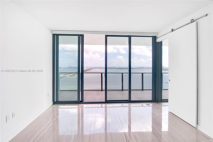 Nestled on the 36th floor of the sophisticated One?Paraiso condominium in Edgewater, this refined 2-bed, 2-bath  residence with incredible views of the bay and features a private elevator foyer, floor-to-ceiling impact glass, marble floors throughout and an open chef’s kitchen with stainless appliances. Panoramic Biscayne Bay and Miami skyline vistas. The building offers resort-style amenities including multiple pools, spa/interior steam, tennis courts, fitness and party rooms, valet, 24-hour attended lobby and card-entry security. Pets permitted. Located steps  from the hottest spots of Wynwood,  Design District and Midtown dining and boutiques and across the street from Whole Foods and minutes of Miami's most pristine Beaches and enternatiment.