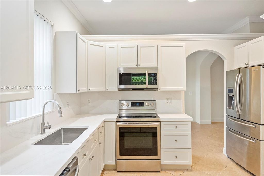 Photo of 12858 SW 52nd St, Miramar, FL 33027 (MLS # A12024613)