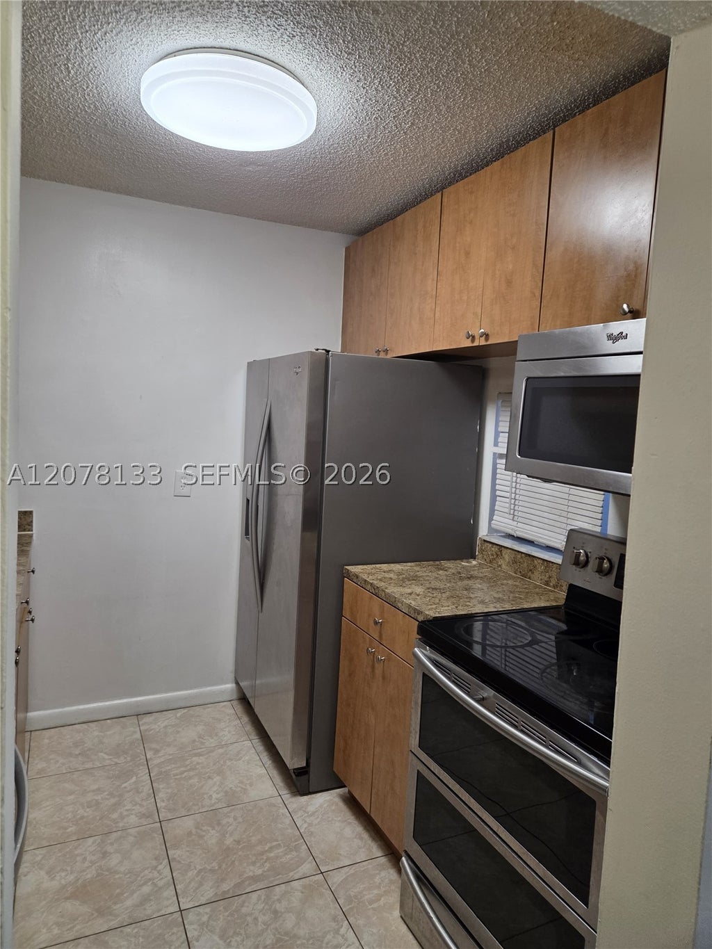 Photo of 8550 N Sherman Cir #103, Miramar, FL 33025 (MLS # A12078133)