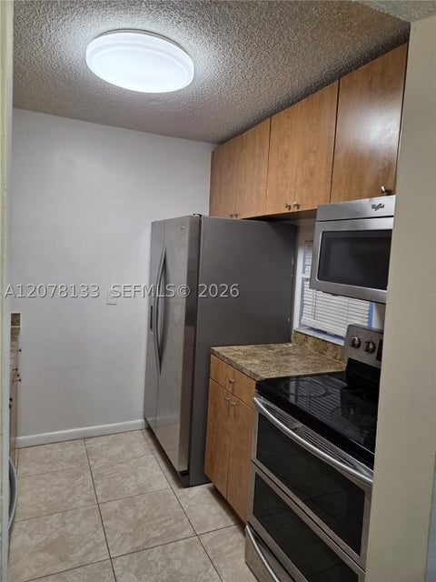 Photo of 8550 N Sherman Cir #103, Miramar, FL 33025 (MLS # A12078133)