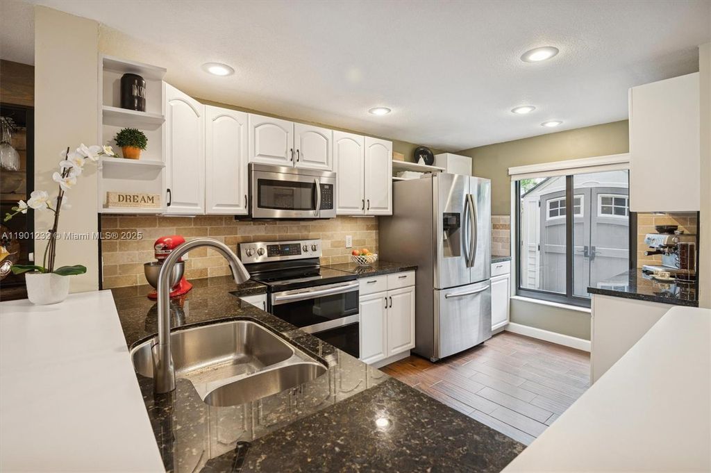 Photo of 5184 S University Dr, Davie, FL 33328 (MLS # A11901232)