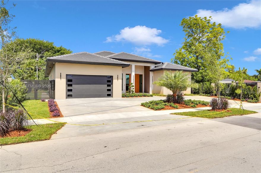 Experience the epitome of luxury living with this stunning 5/4 bathroom masterpiece located in one of Miami's most sought-after neighborhoods. This beautiful automated, customized home features soaring 15-1/2 foot ceilings and expansive windows that flood the interiors with natural light, creating a bright and inviting atmosphere.
Highlights include: Two master suites with custom walk in closet and unique lighting fixtures. Gourmet Custom Kitchen designed with bespoke cabinetry and high end counter tops for the ultimate cooking experience. Outdoor Oasis to enjoy private customized pool and hot tub for outdoor entertaining. Seamless finishes for every detail is crafted with precision offering a sleek and sophisticated aesthetic in every room.