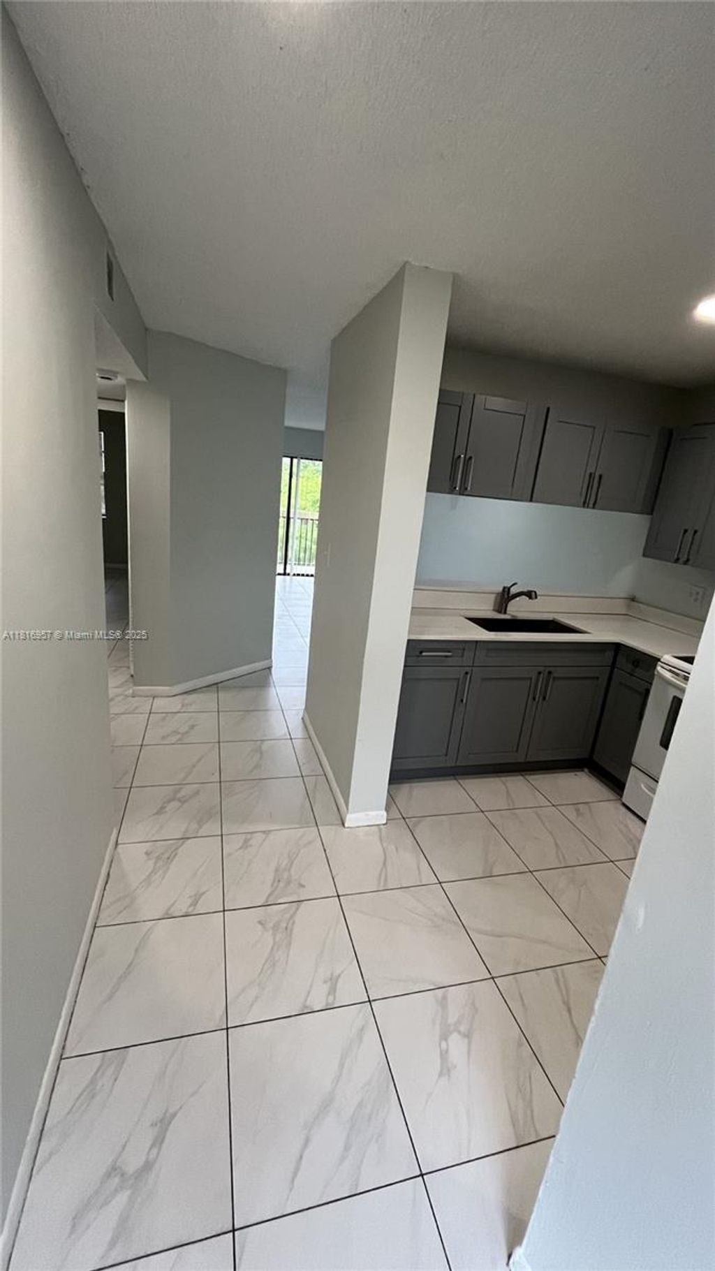 Photo of 4016 Lakeside Drive #4016, Tamarac, FL 33319 (MLS # A11816957)