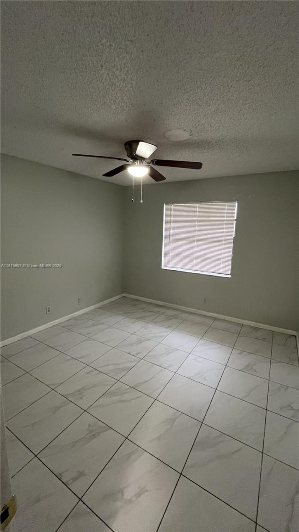 Photo of 4016 Lakeside Drive #4016, Tamarac, FL 33319 (MLS # A11816957)