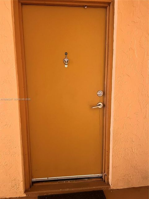 Photo of 7160 Fairway Dr #J16, Miami Lakes, FL 33014 (MLS # A11996347)