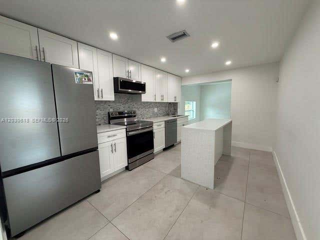 Photo of 4028 SW 49th Ct, Dania Beach, FL 33314 (MLS # A12030618)