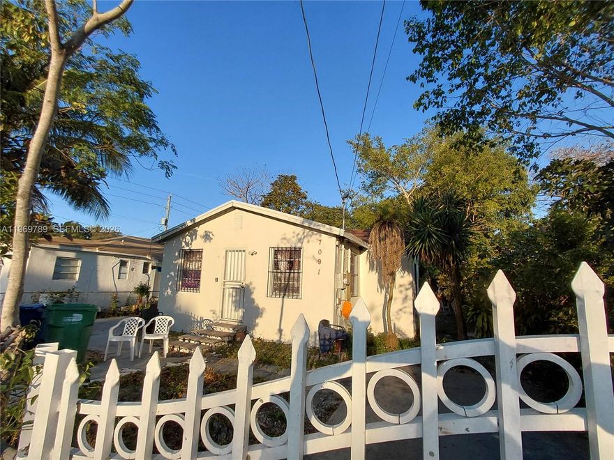 Rare opportunity to own your dream home in West Little River Neighborhood. This stunning 3- Bed, 1- Bath home is completely fenced in with a private gated driveway. Step inside the sliding gates and be greeted by a spacious living area. Kitchen includes white Cabinets with backsplash. Porcelain Tile Floors. Central A/C. Laundry Connections with W/D. Tankless Hot Water Heater. It's the perfect investment for someone looking to add their personal touch and make this house a dream home, clean but dated. Spacious layout, great location, and the chance to build immediate value. Don't miss out on this chance to own in sought-after Miami West Little River neighborhood. Great front porch with private gated parking. Covered back patio great for entertainment. Laundry area, Large yard and the property is surrounded by well-maintained homes in a highly desirable neighborhood. Brokered By Lexico Realty; Call for Showings! Occupied by Month-to-Month tenant paying $2500/mo plus sec dep. Can be delivered vacant at closing!