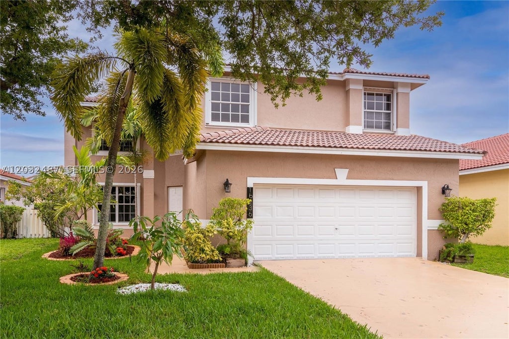Photo of 16236 NW 18th St, Pembroke Pines, FL 33028 (MLS # A12032487)