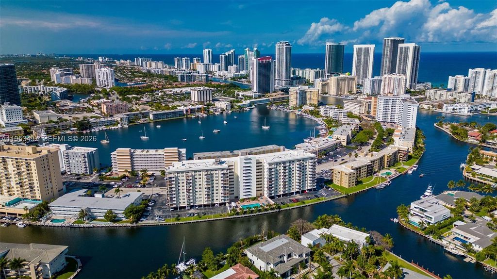 Photo of 401 Golden Isles Dr #304, Hallandale Beach, FL 33009 (MLS # A11953497)