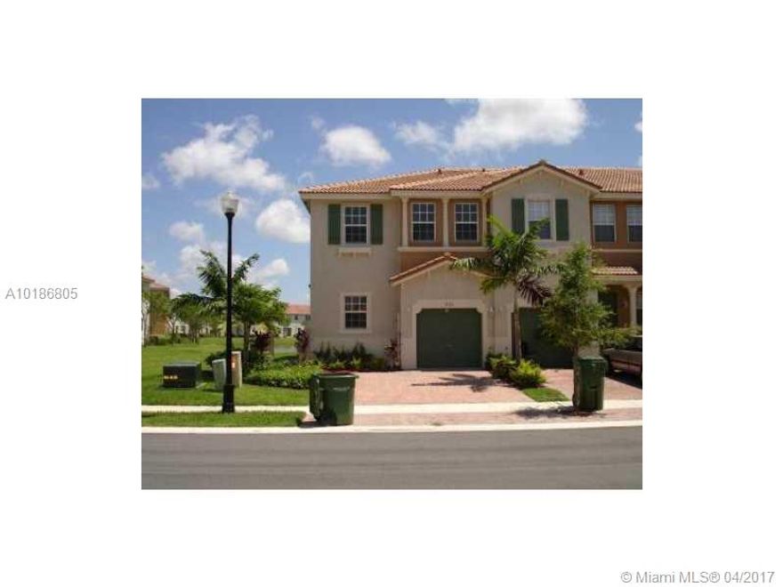 Spectacular Corner Unit! Home features 3 beds, 2.5 baths, 2-story townhouse w/1-car garage in a quiet community of "Portofino Villas West"! Ceramic tile on the 1st floor & wood on the 2nd floor, Kitchen is nice & big, laundry room is on the 2nd floor w/washer & dryer, hurricane shutters & nice fenced backyard. Community w/pool, clubhouse & gated. Close to shopping centers, restaurants & major highways. EASY TO SHOW! LOW HOA FEES $155 month!!