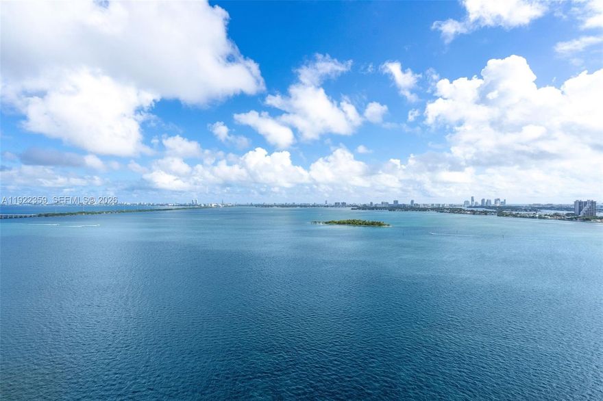 Best value for a Spectacular bayfront, move-in-ready full 3-bedroom + den residence at Aria Reserve. No other unit has these amount of features for this price. Miami brand new, fully upgraded, and perched on the 20th floor with direct, sweeping 180° Biscayne Bay views. Residence comes with 2 ASSIGNED PARKING SPACES which are a rare commodity.

This exceptional home features an oversized den with a fully finished closet, perfect as an office, media room, or flexible fourth-room option. The kitchen showcases top-of-the-line Thermador appliances, including an induction cooktop with extractor, wall oven, and built-in microwave. All bedrooms and the den come with custom finished closets, while the bathrooms are beautifully appointed and include a luxury LED smart mirror in the primary suite. Additional upgrades include motorized shades throughout (with full blackouts in all bedrooms), garbage disposal, and two highly desirable assigned parking spaces.

Aria Reserve stands out as one of Miami’s most amenity-rich communities, offering unmatched resort-style facilities paired with surprisingly low monthly maintenance fees. Ideally located in the heart of Edgewater, you’re just minutes from Wynwood, the Design District, Downtown, Brickell, and Miami Beach.

With its exceptional upgrades, turnkey condition, premier bay views, and unbeatable amenity package, this residence delivers remarkable value and a truly elevated lifestyle.