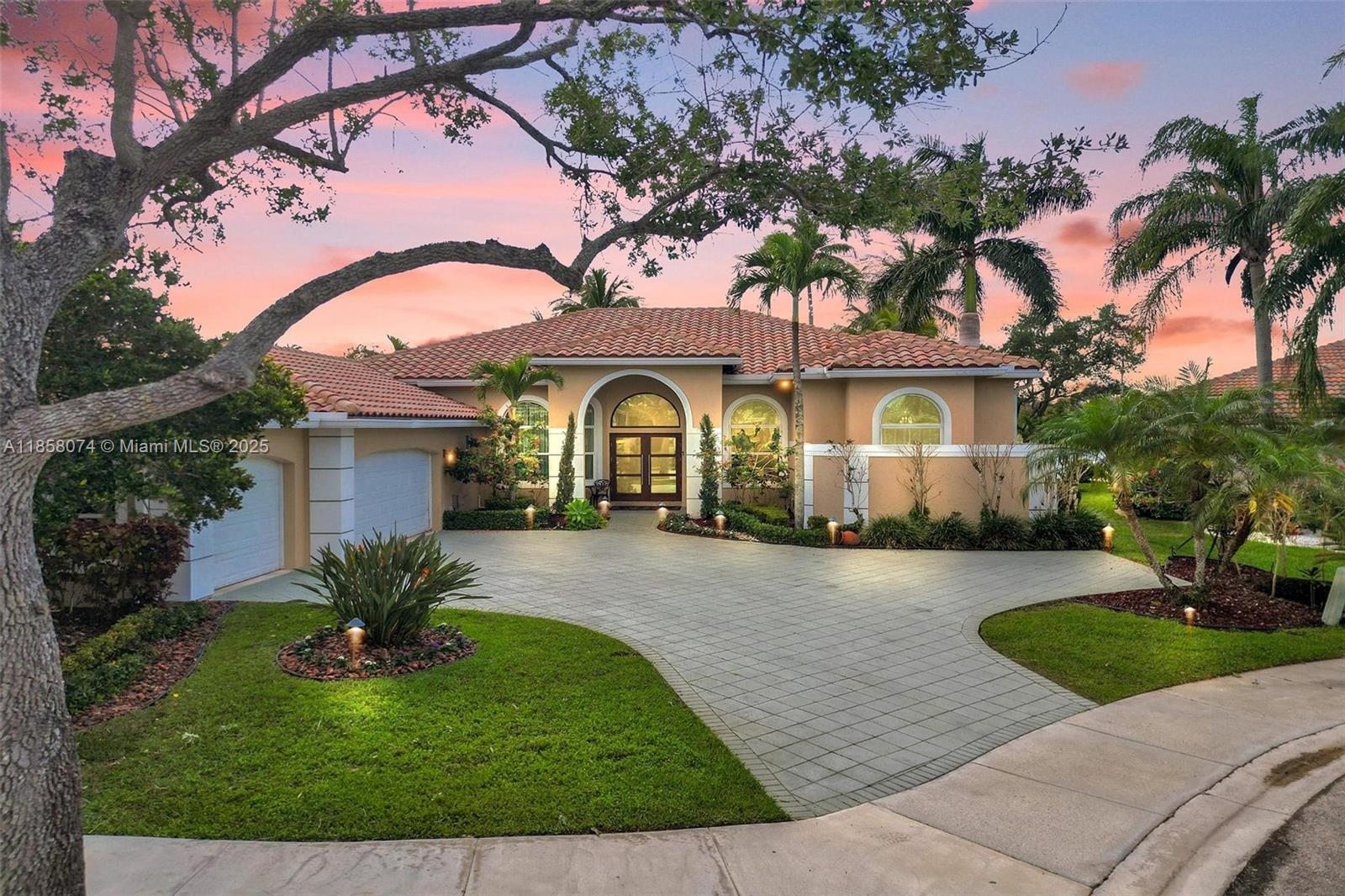 Spectacular one story completely remodeled home in the rarely available exclusive community of Edgewater at Weston Hills Country Club. This gorgeous home is situated on a peaceful cul-de-sac lot with a nearby community park. Breathtaking Panoramic Lakeview! Features include 4 Bedrooms plus office/den & 3.5 bathrooms. Beautifully remodeled kitchen with Taj Mahal quartzite. Spacious split bedroom floor plan with volume ceilings, luxury flooring throughout, redone and spacious family room, multi room high end audio system. New Screened POOL with water feature and Patio overlooking tranquil lake views! Newer Roof Impact Window and Doors, 3 car garage with built-in cabinetry, storage, epoxy flooring and 2 EV charging stations & A+ Schools. This is the home you have been waiting for!