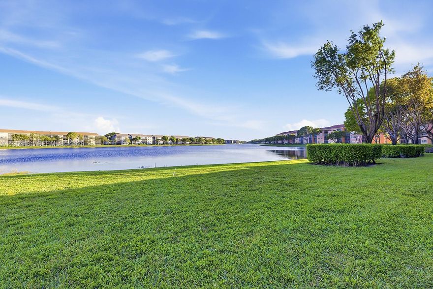 Beautiful Lake Views!! Charming fully remodeled condo in Century Village offering tranquil lake views from the living areas. This residence features a contemporary modern kitchen with ceiling-height custom cabinetry, A/C (2022), brand-new tankless water heater, premium waterproof vinyl flooring, fresh designer paint, and LED lighting throughout. Both bathrooms have been tastefully modernized. Accordion shutters included. Located in an exclusive 55+ community with resort-style amenities including a golf course, swimming pools, fitness centers, and an active clubhouse. Ideally situated near upscale shopping, dining, and entertainment. HOA $778. Includes water, cable, internet, master insurance, clubhouse, and much more!