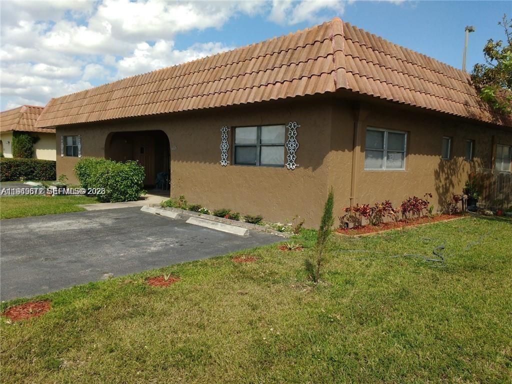 Photo of 7006 NW 78th Ave #1-2, Tamarac, FL 33321 (MLS # A11949672)