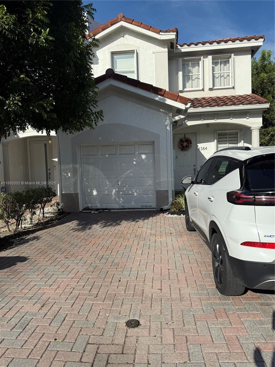 Hard-to-find 3/2.5 end unit townhome in the desirable Sandcastle gated community in Doral! This spacious home features a private backyard, garage, hurricane shutters, and laminate flooring upstairs, plus plenty of guest parking conveniently located right next to the property. Perfect for investors or owner-occupants, it offers comfort, privacy, and excellent value with a low association fee. Ideally located near major highways, shops, and restaurants, this townhome combines the best of convenience and lifestyle — in one of the best-located communities in Doral!