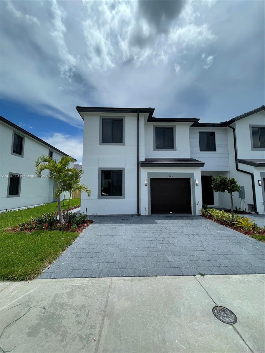Nestled in the Century Park Square community a new community in Florida City across from Robert is Here. This brand-new 2-story townhouse offers 4 bedrooms & 3 bathrooms with modern finishes & abundant natural light. One bedroom & a full bath on the first floor provide flexible living space for guests, multigenerational families or a home office. Tile flooring extends throughout the home for easy maintenance & a sleek look. Large windows in every room flood the interior with sunshine, making the unit feel bright & airy. The open kitchen is designed for convenience, featuring plenty of cabinetry & counter space. Additional highlights include a one-car garage & a fully fenced backyard – perfect for privacy and outdoor relaxation. Vouchers are welcome! Landlord is a Miami Dade Housing Vendor.