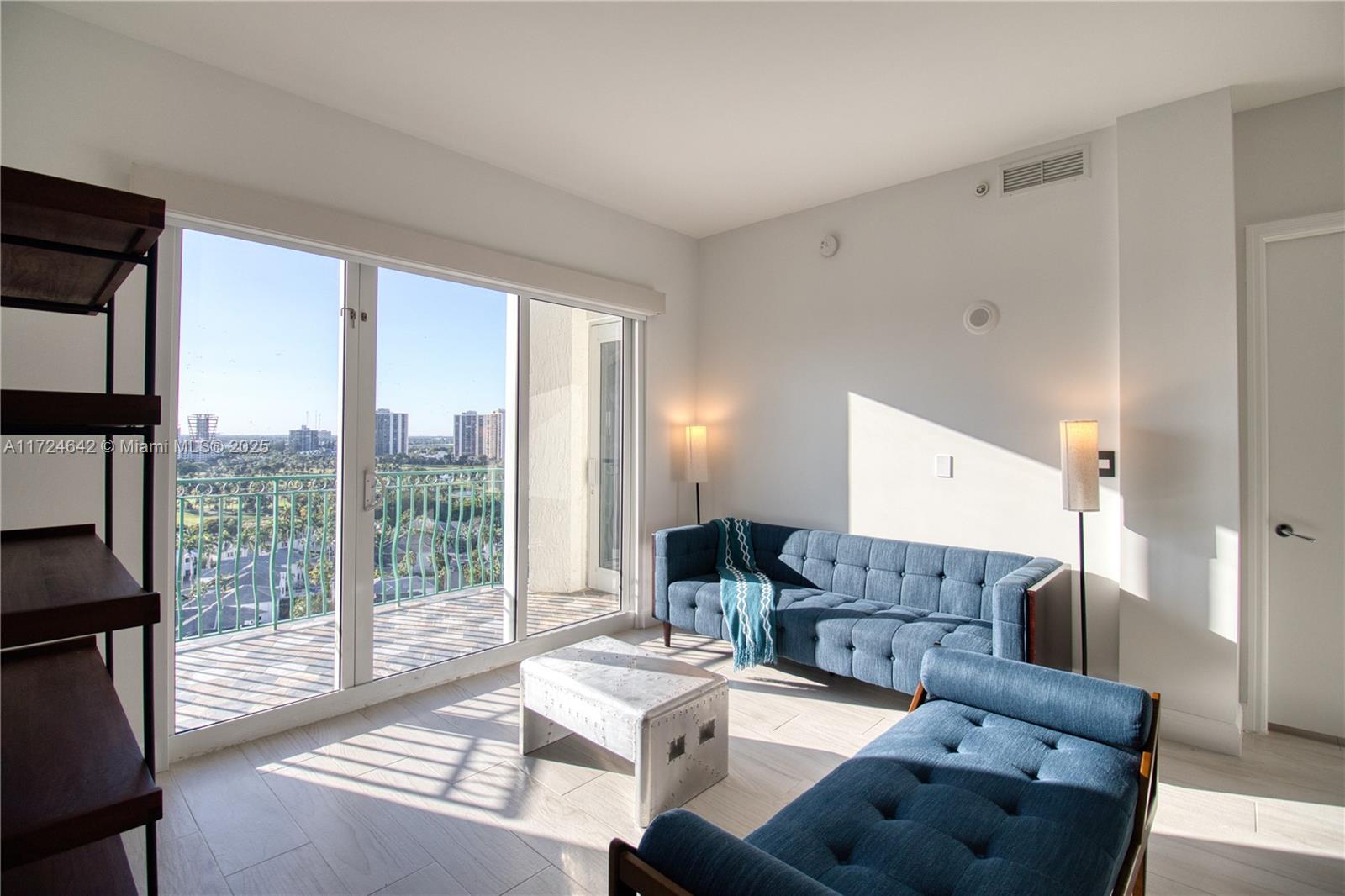 Stunning high-floor unit in Turnberry Village offering breathtaking panoramic views of the Turnberry Country Club Golf Course and stunning city vistas. This spacious 2-bedroom, 2-bathroom residence features walk-in closets, a recently renovated kitchen with modern finishes, and cutting-edge technology throughout. Enjoy electric blackout curtains and roller shades, a new ventilation system with Google Nest thermostat, Nest doorbell & camera, and impact-resistant windows. The building boasts a sleek infinity pool, state-of-the-art gym, and stylish common areas. Ideally located near A+ schools, Aventura Mall, beaches, and just a short bike ride away. Furniture includes modern navy wood pieces, an electronic king bed with massage & anti-snore function, Peloton bike, and additional fridge.