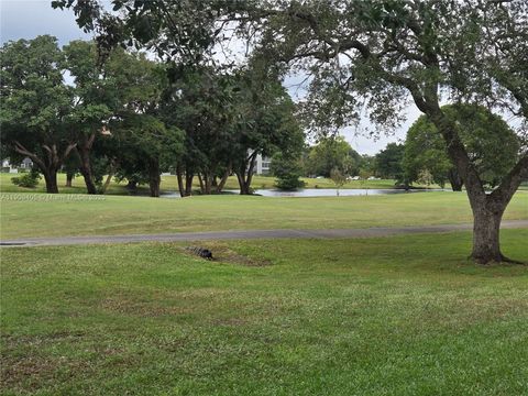 Photo of 300 SW 130th Ter #413B, Pembroke Pines, FL 33027 (MLS # A11909405)