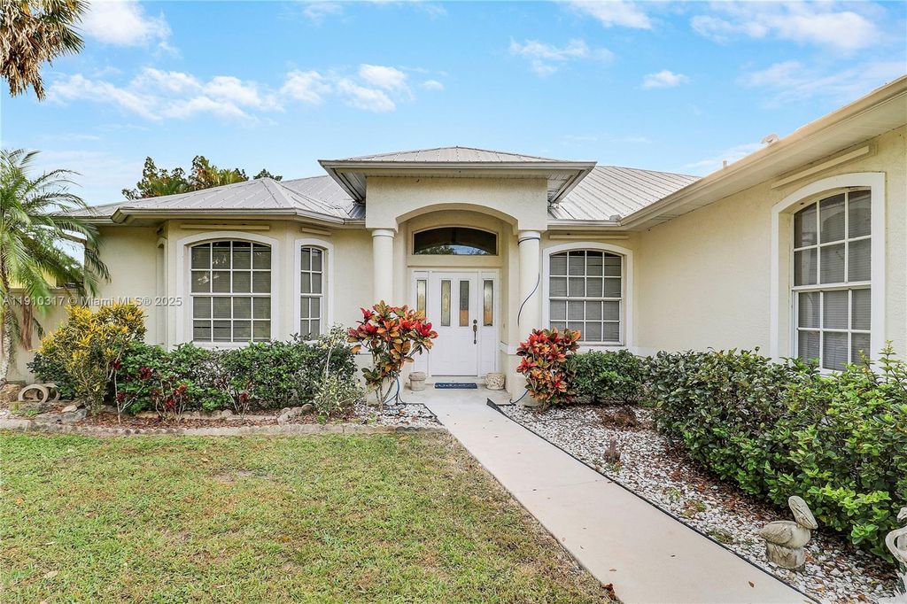 Photo of 759 SW Alton Cir, Port St Lucie, FL 34953 (MLS # A11910317)