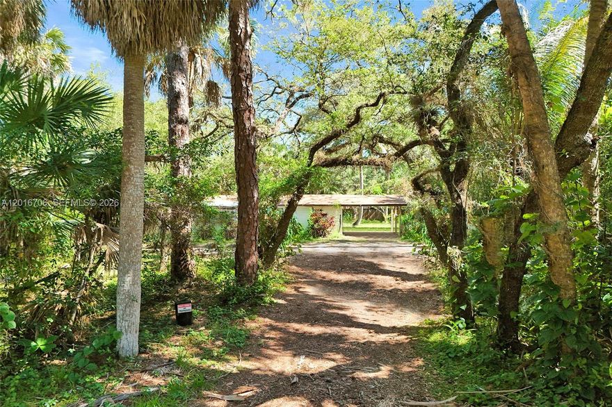 Exceptional opportunity in Riverland with a massive 24,755 SQFT lot zoned RS-3.52. Whether you choose to remodel the existing 2-bedroom home, build your dream estate, or take advantage of the potential to divide the property into two separate lots approximately 10,000–12,000 SQFT each, the possibilities here are outstanding.
The property is beautifully framed by gorgeous mature oak trees, creating a private and picturesque setting.  Conveniently located near I-95, I-595, the Florida Turnpike, and Seminole Hard Rock Hotel & Casino Hollywood, this location offers quick access to all of South Florida.
Outdoor enthusiasts will love the nearby public boat ramp less than a mile away, making it incredibly easy to trailer a boat, jet skis, or other recreational toys. A rare oversized lot opportunity in a rapidly growing neighborhood with endless potential. SOLD AS IS!