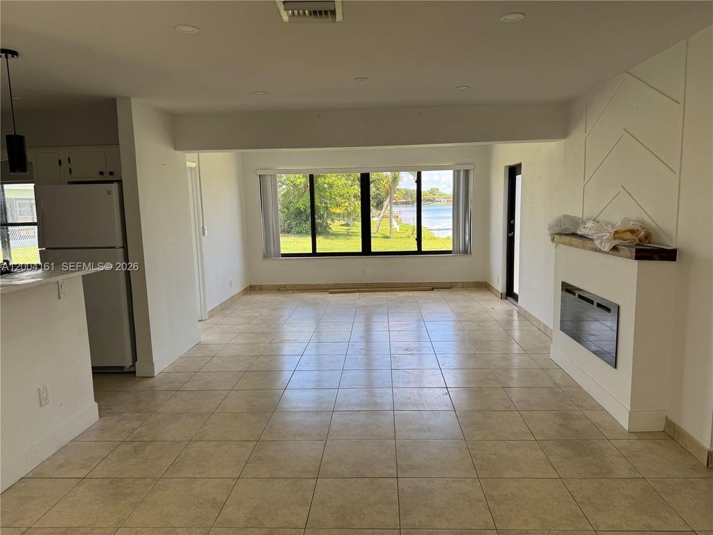 Photo of 8721 NW 11th St, Pembroke Pines, FL 33024 (MLS # A12004161)