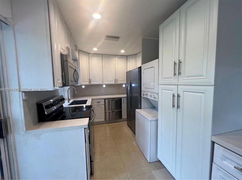 Photo of 1544 Springside Dr #1544, Weston, FL 33326 (MLS # A12001142)