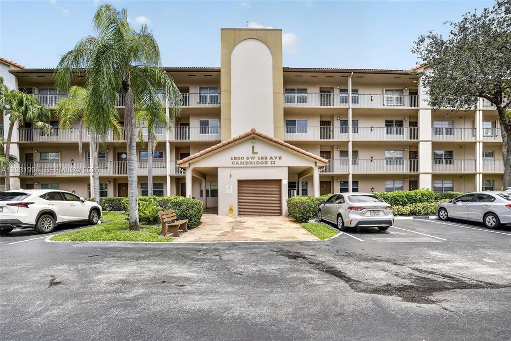 Photo of 1200 SW 125th Ave #410L, Pembroke Pines, FL 33027 (MLS # A12031994)