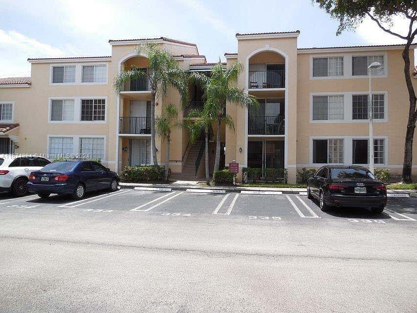 Photo of 1721 Village Blvd #203, West Palm Beach, FL 33409 (MLS # A11571824)