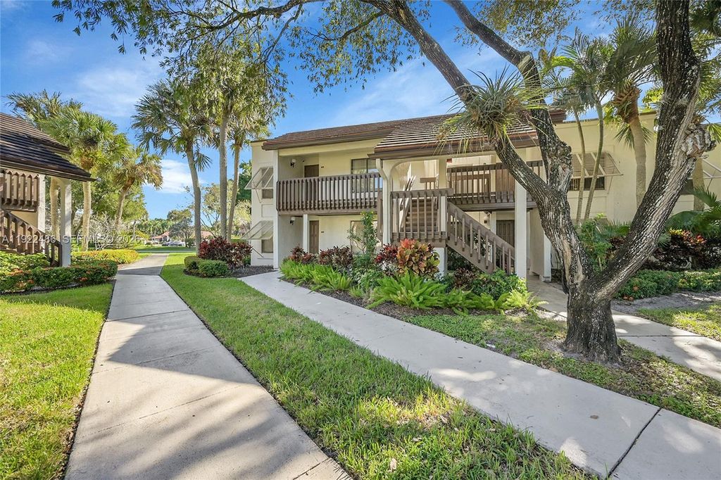 Photo of 10187 Mangrove Dr #201, Boynton Beach, FL 33437 (MLS # A11922486)