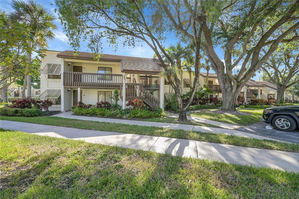 Photo of 10187 Mangrove Dr #201, Boynton Beach, FL 33437 (MLS # A11922486)