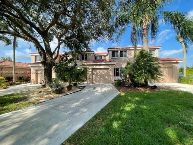 Beautiful Townhome overlooking the lake. One car garage. Bamboo wood floors upstairs and laminate downstairs. Master bathroom has a double shower. Upgraded Master Bathroom. Very nice neighborhood. Home is very spacious. You will enjoy the Beautiful sunsets. Very nice Community. Large patio . Very Good condition. This property is located at the Village at Harmony.