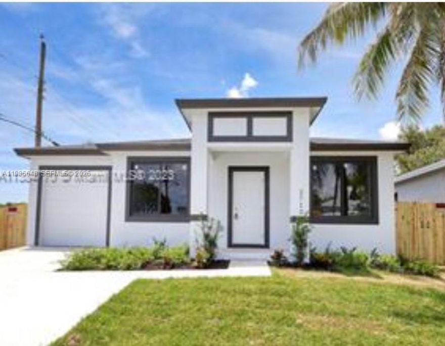 2023 New Construction 3 bed 2 bath 1 car garage, 1786 sq/ft with a large fenced yard. Modern white kitchen with quartz countertops and all stainless steel appliances included.  Porcelain tile flooring throughout. Large master bedroom with walk in closet. Includes features such as hurricane impact glass windows and doors, wall and ceiling insulation and energy efficient tankless water heater and air conditioning unit.  No association, not in a flood zone (X). House complete and ready for move in.