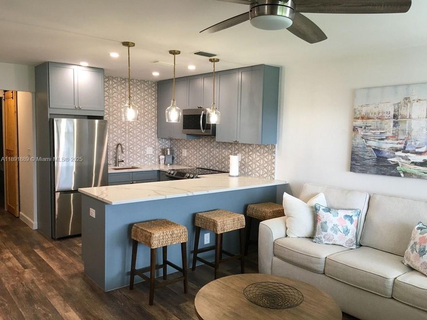 Fully renovated 1BR/1BA condo in Sterling Village just steps from the Intracoastal! This second-floor unit has been completely updated with all work permitted and city-approved. Features include new electrical panel, central A/C, updated plumbing, modern lighting and custom finishes throughout. The open kitchen offers new cabinetry, countertops, and an eat-in layout. Enjoy peace of mind with durable flooring, ample storage, and a screened balcony. Sterling Village is a gated 55+ community with resort-style amenities: clubhouse, pool, putting green, shuffleboard, gym and a scenic waterfront walkway. Just minutes to beaches, dining, and shopping. Turnkey and move-in ready! Owner would also consider seasonal rental.