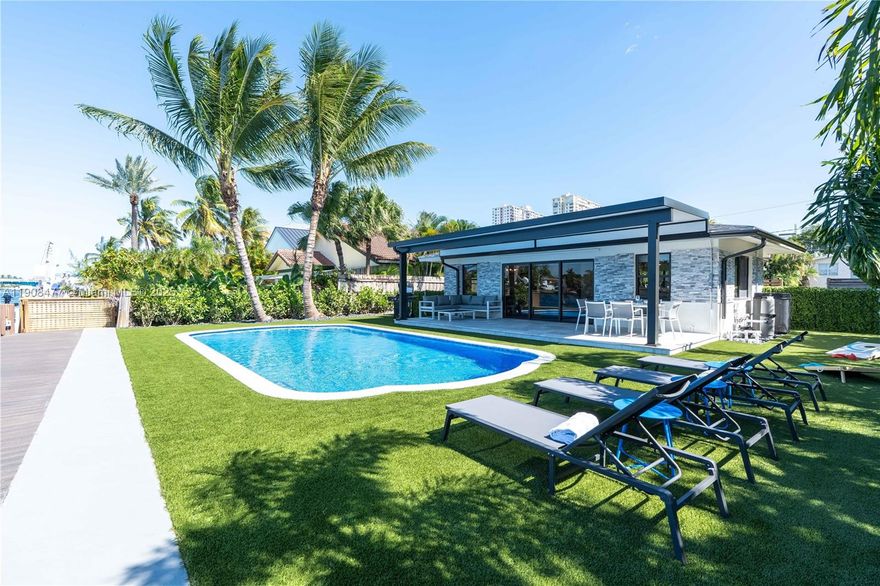 Experience the ultimate in coastal luxury with this newly renovated and fully furnished waterfront cottage on the Intracoastal in beautiful Pompano Beach. This home boasts a brand-new, glowing pool with desirable west exposure—perfect for breathtaking sunset views over the water. Inside, enjoy a spacious open-concept layout featuring a chef’s kitchen with high-end finishes and modern appliances. Every detail has been thoughtfully designed for comfort and style, offering a true turnkey experience. Available for seasonal rental at $12,500/month (tax included). Live the Florida lifestyle at its finest!