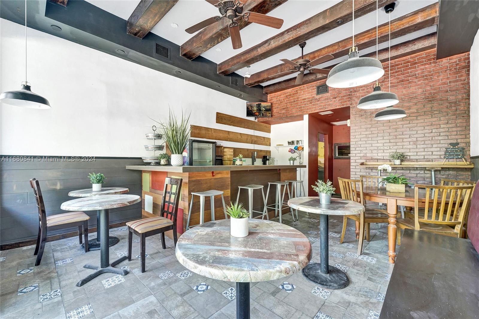Located right between Upper Buena Vista and the Miami Design District, this 2nd generation restaurant space offers a fantastic leasing opportunity for those looking to enter or expand within the vibrant Miami dining scene. The space comes fully equipped with a grease trap and necessary equipment, providing a seamless, turnkey solution for your culinary vision. The lease is priced at $7,000 per month (NNN) with key money required. Positioned in a high-traffic area, this compact and efficient space is ideal for a boutique eatery or a trendy café. This prime location ensures excellent visibility and accessibility. Parking is available on a first-come, first-served basis.