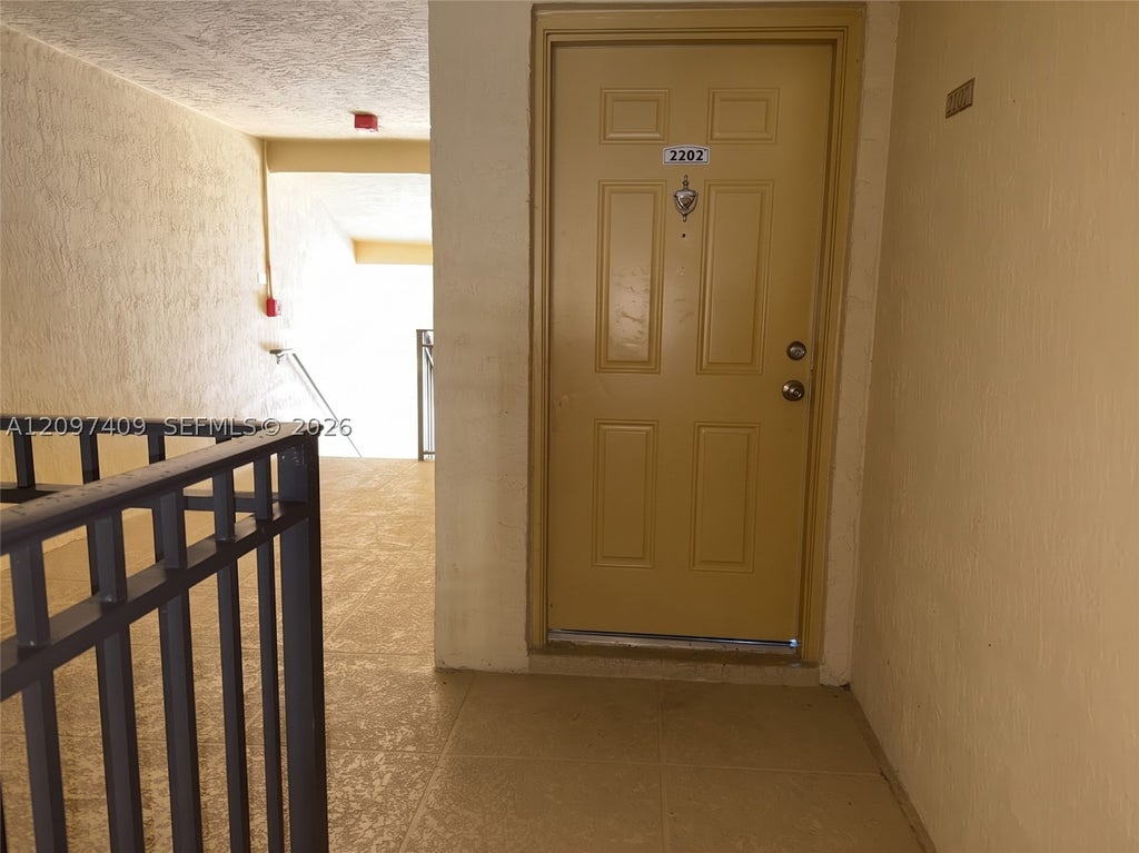 Photo of 1265 SW 46th Ave #2202, Pompano Beach, FL 33069 (MLS # A12097409)