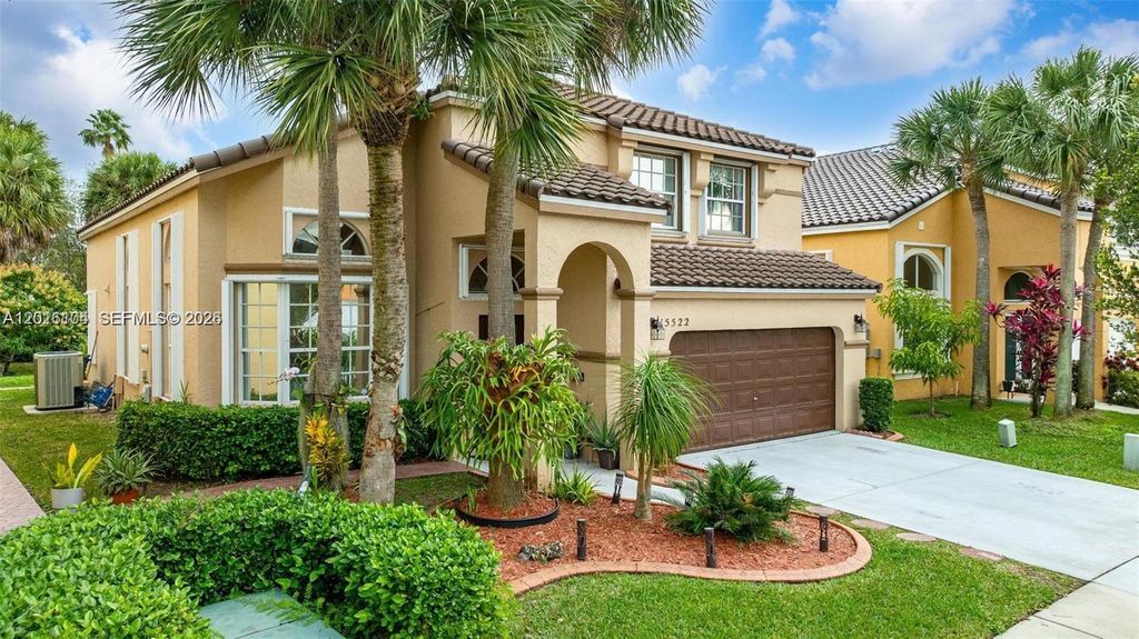 Photo of 15522 NW 12th Ct, Pembroke Pines, FL 33028 (MLS # A12016104)