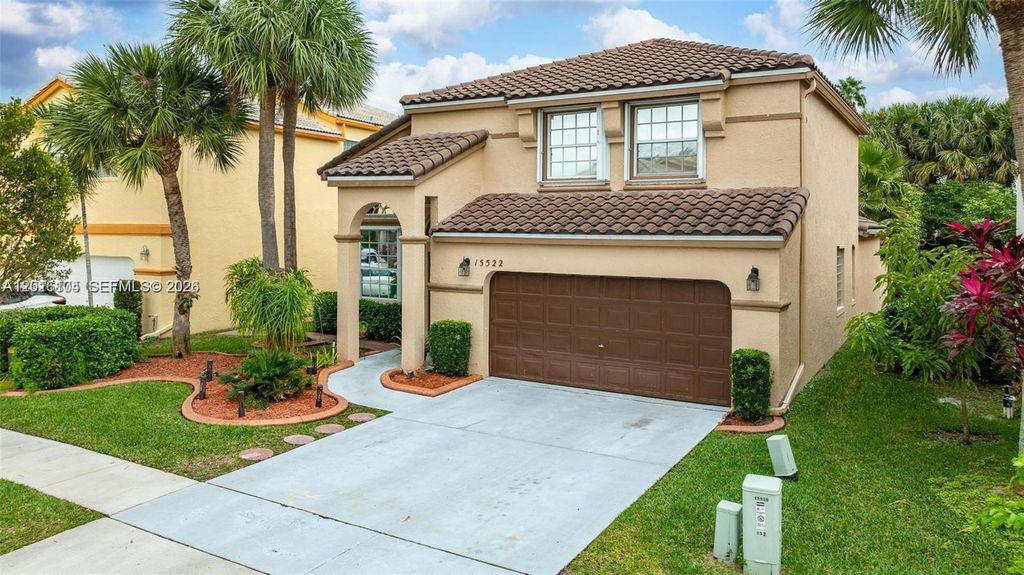 Photo of 15522 NW 12th Ct, Pembroke Pines, FL 33028 (MLS # A12016104)