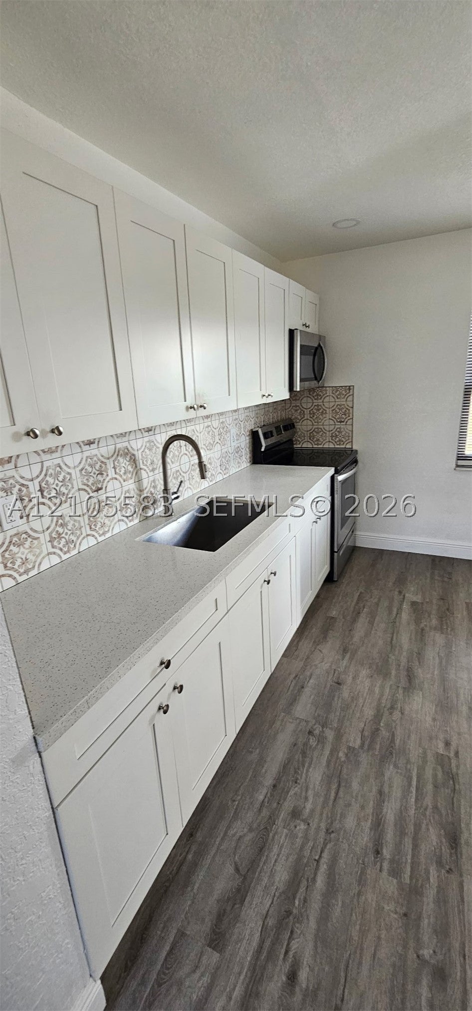 Photo of 915 Avenue M, Fort Pierce, FL 34950 (MLS # A12105583)