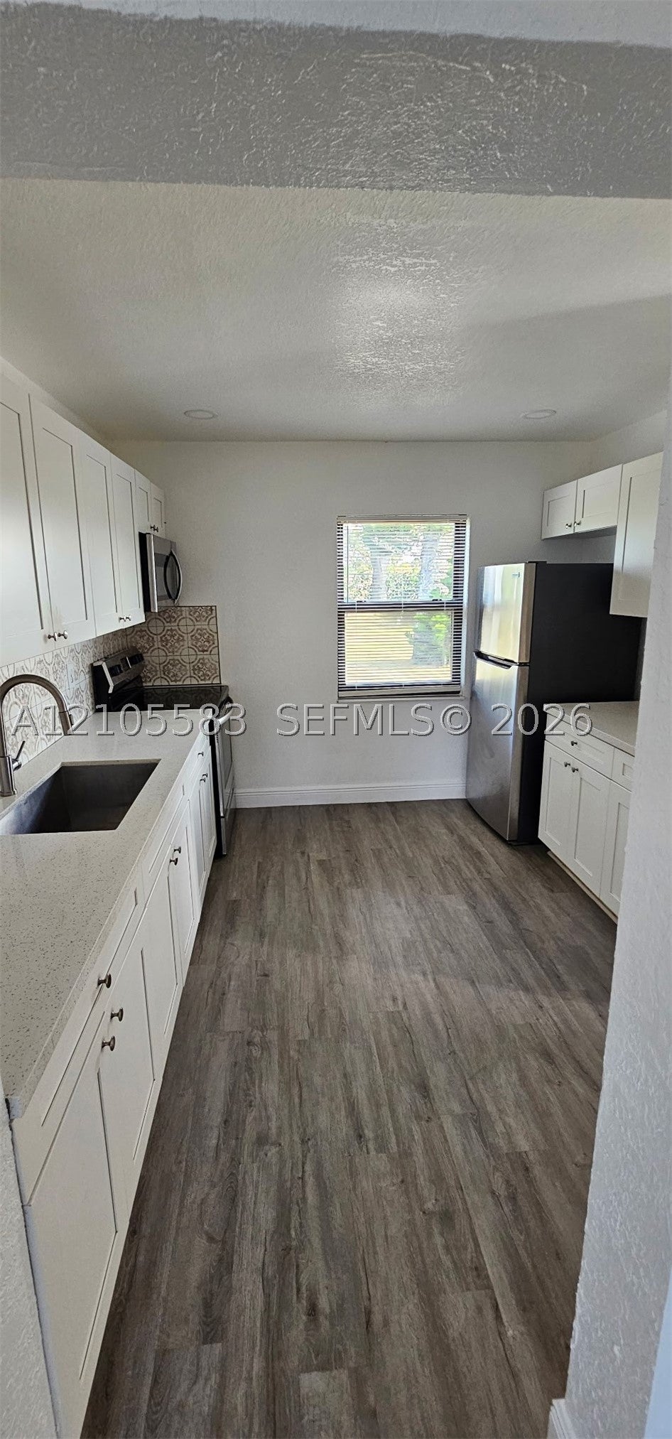 Photo of 915 Avenue M, Fort Pierce, FL 34950 (MLS # A12105583)